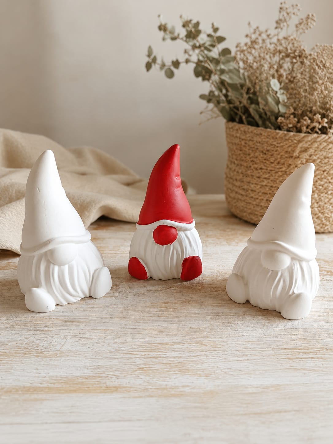 Gnomos de Natal sentados